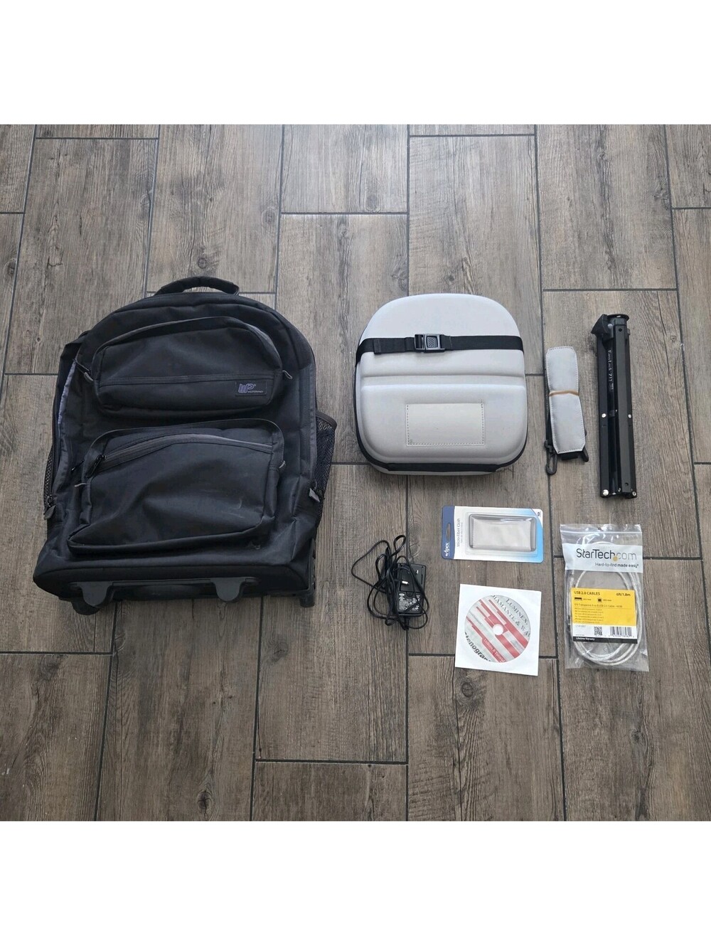 Stenograph’s The Wave Bundle - Tripod, Charger, Case, Roller Bag, CD, PC Cable